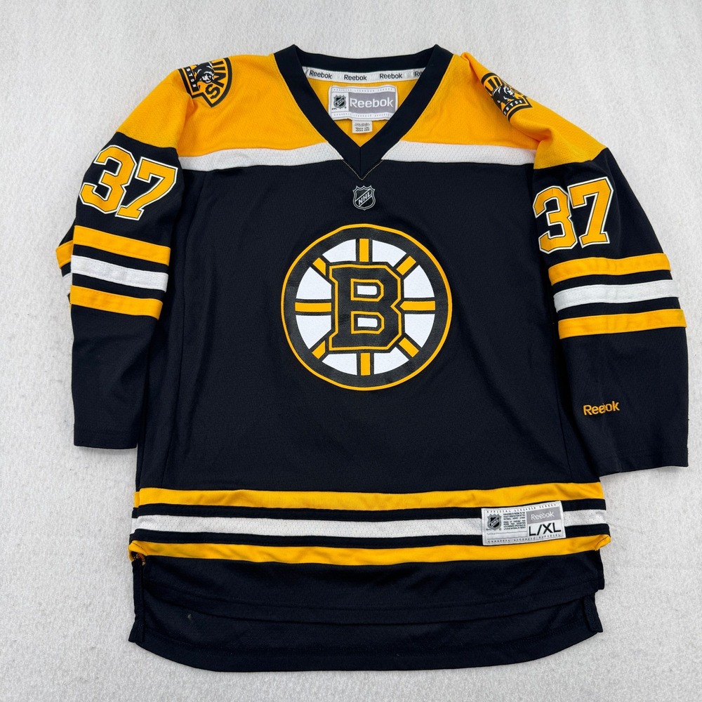Reebok NHL Boston Bruins Patrice Bergeron 37 Youth L/XL Hockey Jersey Black Gold